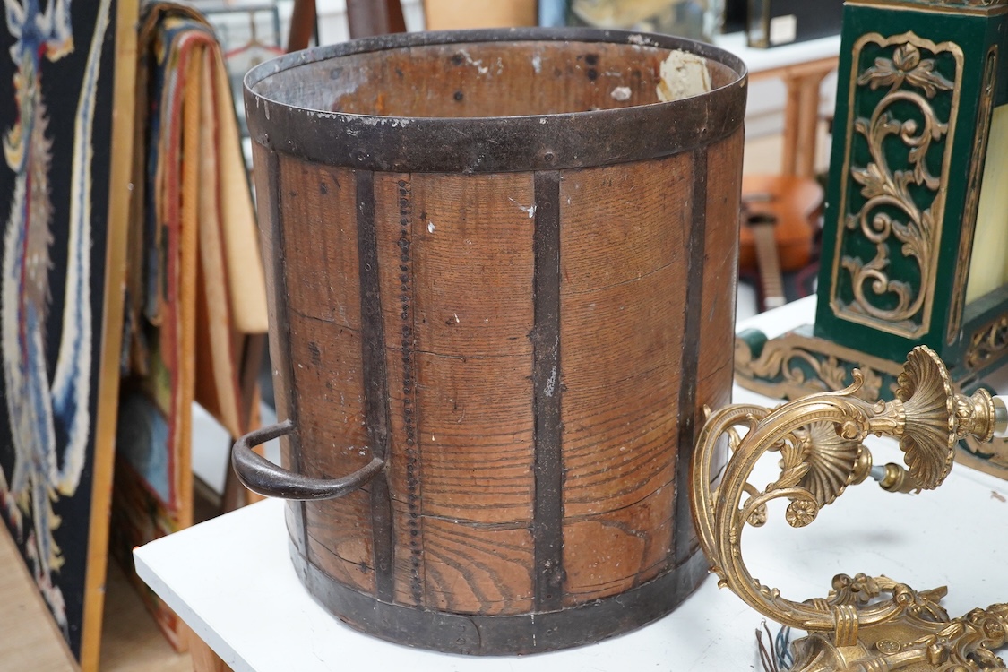 A Georgian iron framed oak Bushel measure, stamped with ‘BUSHEL’ and a crowned GR, diameter 36cm, height 38.5cm